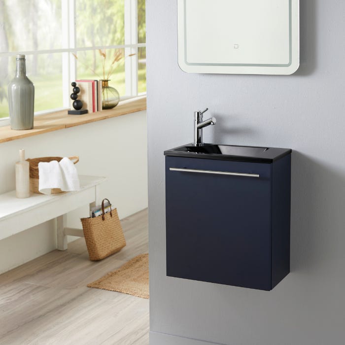 Meuble lave mains bleu nuit avec lave mains noir en solid surface et robinet eau froide à gauche