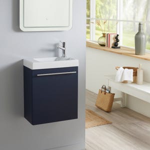 Meuble lave mains bleu nuit avec lave mains en céramique et robinet eau froide à droite