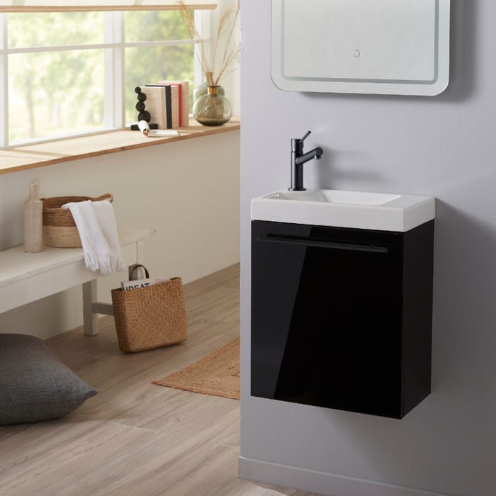meuble pour WC noir brillant avec vasque en céramique blanche et mitigeur noir